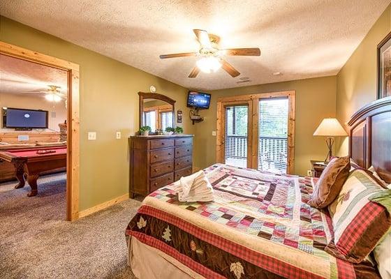 Full view of Bedroom number 3 on lower level. Bedroom 3 and 4 are separated by game room for privacy. Both have access to hot tub.