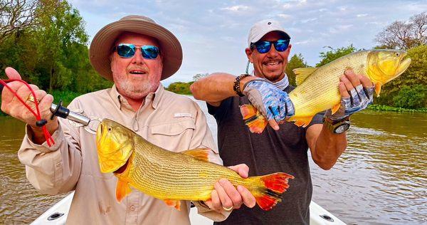 Craig Ross & Ron Blank in Argentina. Golden Dorado!