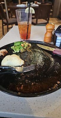 Picture the perfect medium cooked riveted w/ onions and bell pepper slices on top. Sorry, ate it before I decided to take a picture.