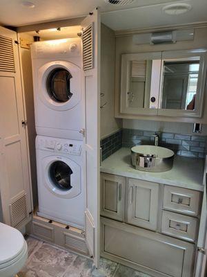 Stackable washer/dryer install in Newmar product.