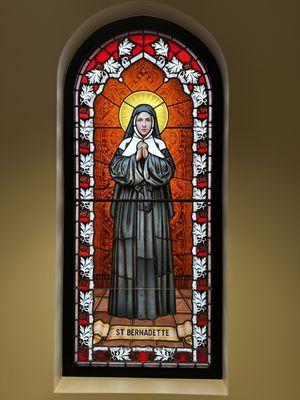 One of the many beautiful custom made stained glass windows in the church.