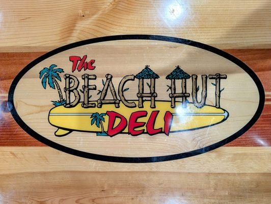 The Beach Hut deli logo, tabletop
