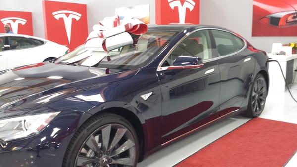 At theTesla Costa Mesa delivery center. We've been hired to prepare these beautiful vehicles for delivery for their customers!