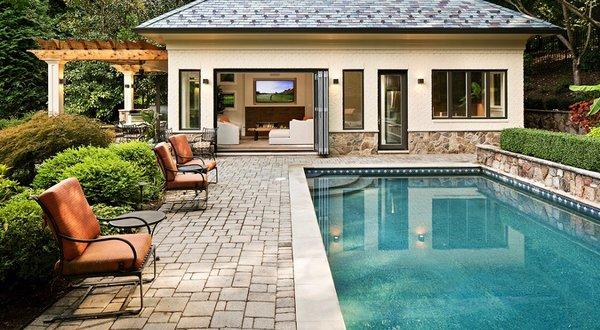 Walkway to a beautiful guest house. Custom stone work on the exterior of the house.