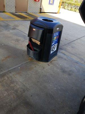 Garbage and windshield wash station