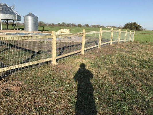 Ranch style panel and treated fence