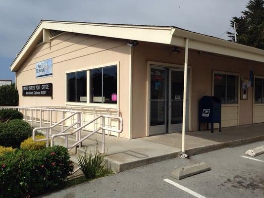 Post Office is next door to Odyssey Pizzeria and Cafe.