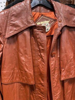 $120 for a leather (?) coat with discolored spots