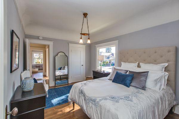 Sold by Dianna and Mark! A stunning Bronze Coast Colonial Revival staged by Alameda Staging Co.