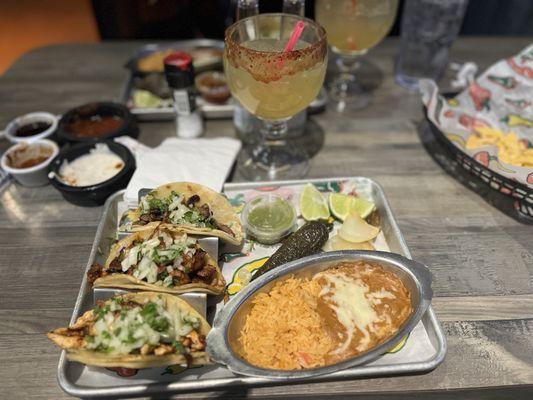 Carne asada taco (steak taco) , Al pastor taco (pork taco) y pollo taco (chicken taco).