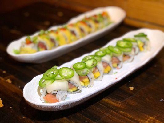 White Castle Roll is in front. $14 salmon, mango, and avocado draped with super white tuna, and sliced jalapeño!