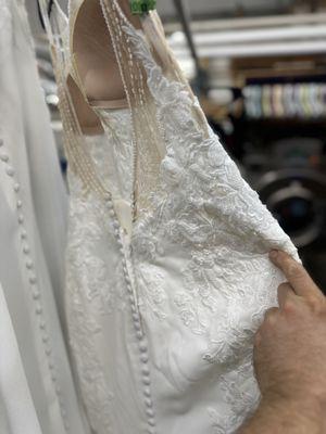 Dry Cleaning the wedding dress and removing all the stains