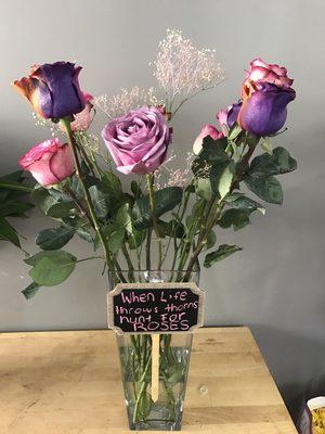 "When life throws thorns hunt for roses"