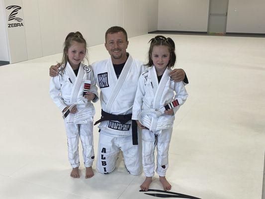 My girl's always looking forward to getting their next stripe with all their BJJ friends!