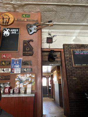 In the bar. With friends.