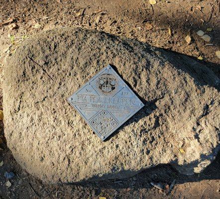 Metal plaque for Pia the Peacekeeper.