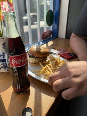 Cheeseburger with side of seasoned fries