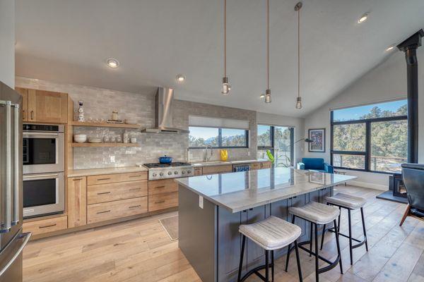 Waypoint cabinetry with quartzite countertops