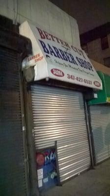 This is a photo of the barbershops exterior.