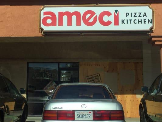 Outside of the NOW CLOSED ameci pizza.