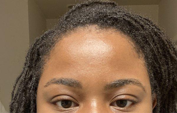 This is after the threading today. She rushed and completely messed up my brows!