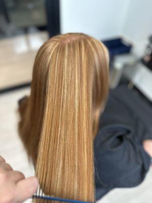 A young virgin haired ginger wanting something new. We didn't want to lose her natural red so we added a few hilites to brighten it up