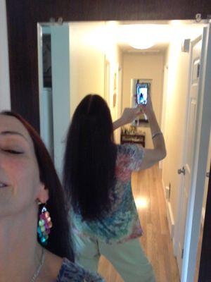 Liane helped me grow out a spiral perm, at shoulder height. This is her work!