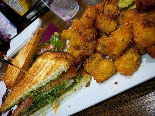 Grilled chicken pesto sandwich with tater tots