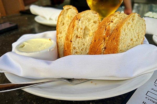 Complimentary warm bread with real butter.