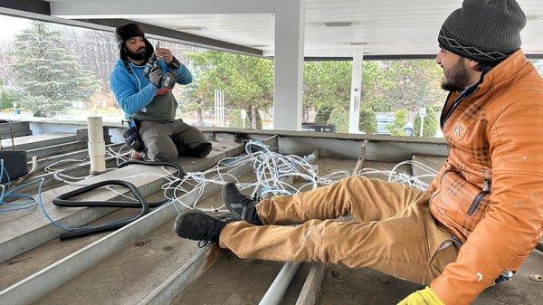 Fishing wires from canopy roof to convenient store