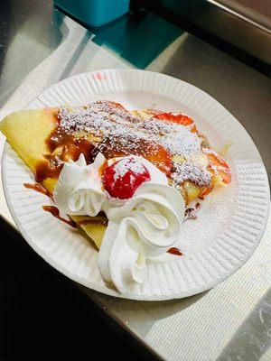 Our delicious Nutella crepe with strawberries and bananas!