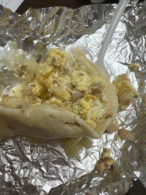 Bacon taco with potatoes and cheese