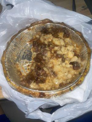 Looked like dog food and was very nasty bowl was full of empty oxtail bones. Smh