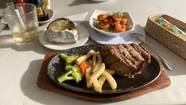 10oz tenderloin done Extra Rare , Garlic shrimp, and a Jameson's and ginger.