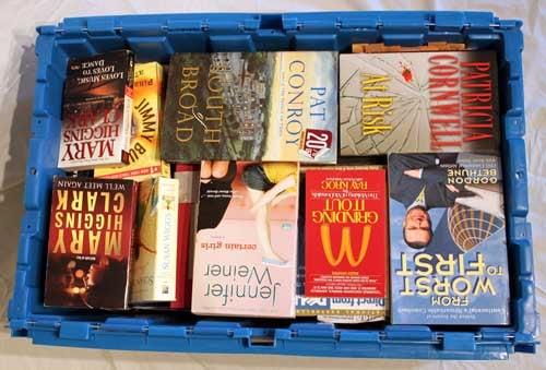 One of our bins filled with books.