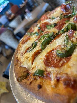 Build your own pizza with pepperoni and jalapenos