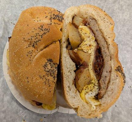 Breakfast menu - The Mess Egg Sandwich: 2 eggs, Bacon, Ham, Sausage & Home Fries on a roll ~ 6.22.25
