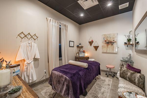 Experience peace and renewal in our serene massage room at Mint Spa RVA. Call 804-651-7298 to book your massage today!