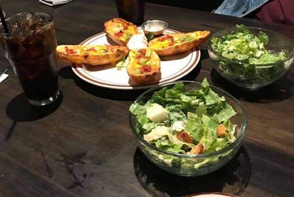 Tater skins and Caesar salads.