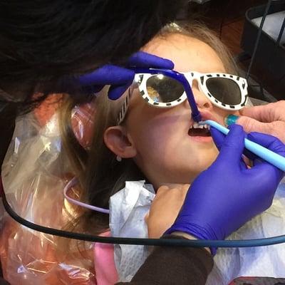 Utilizing ozone instead of drilling to help treat small cavities, especially for our little ones!