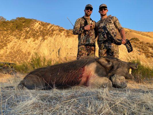 My son's first wild pig!