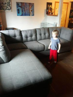 New sofa and one happy kid