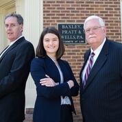 John W. Wells, Esq., Jessica L Benson, Law Clerk, and Charles B. Baxley, Esq.
