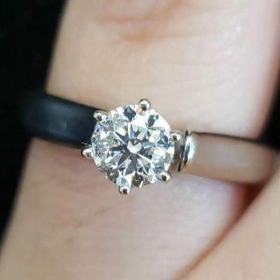 Resized and polished white gold diamond ring.