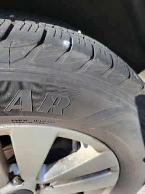 Screw in tire shoulder