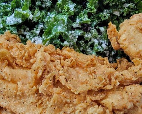 Krispy Fried Chicken over a Kale Salad with Lemon Vinaigrette, Cherries, Parmesan and Almonds