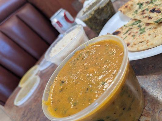 Chicken Vindaloo, an almost creamy curry with potatoes, chicken cinnamon, ginger and different spices.