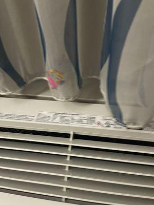 Wax, crayon or something that a simple cleaning would do!