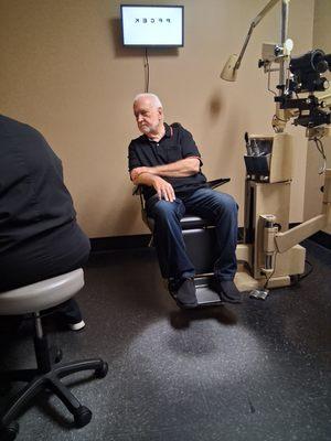 Eye exam room w dr and husband Les