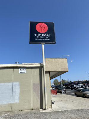 When u see this sign make turn to driveway office is located in the second floor